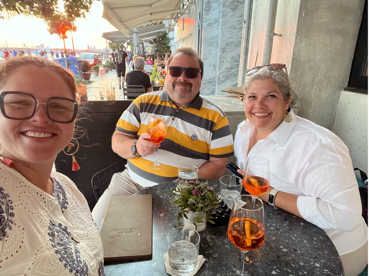 Researchers at a sidewalk cafe