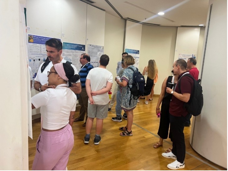 Attendees viewing poster presentations