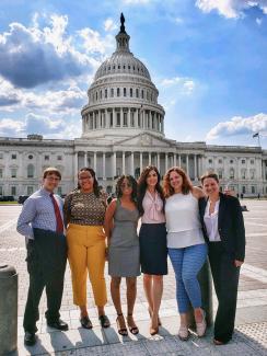 Research trainees in a group photo in front of the U.S. Capital Building